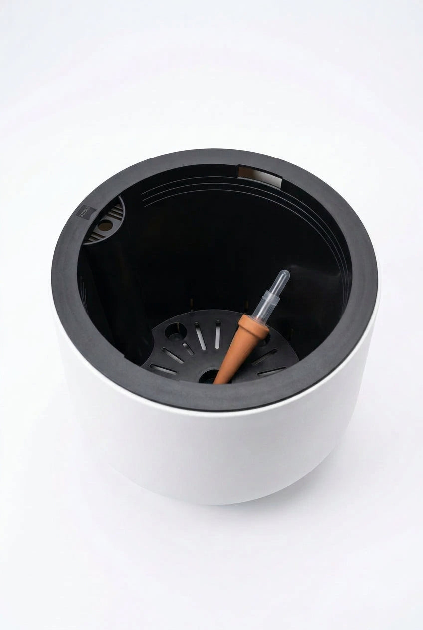 Hydro pot self watering pot
